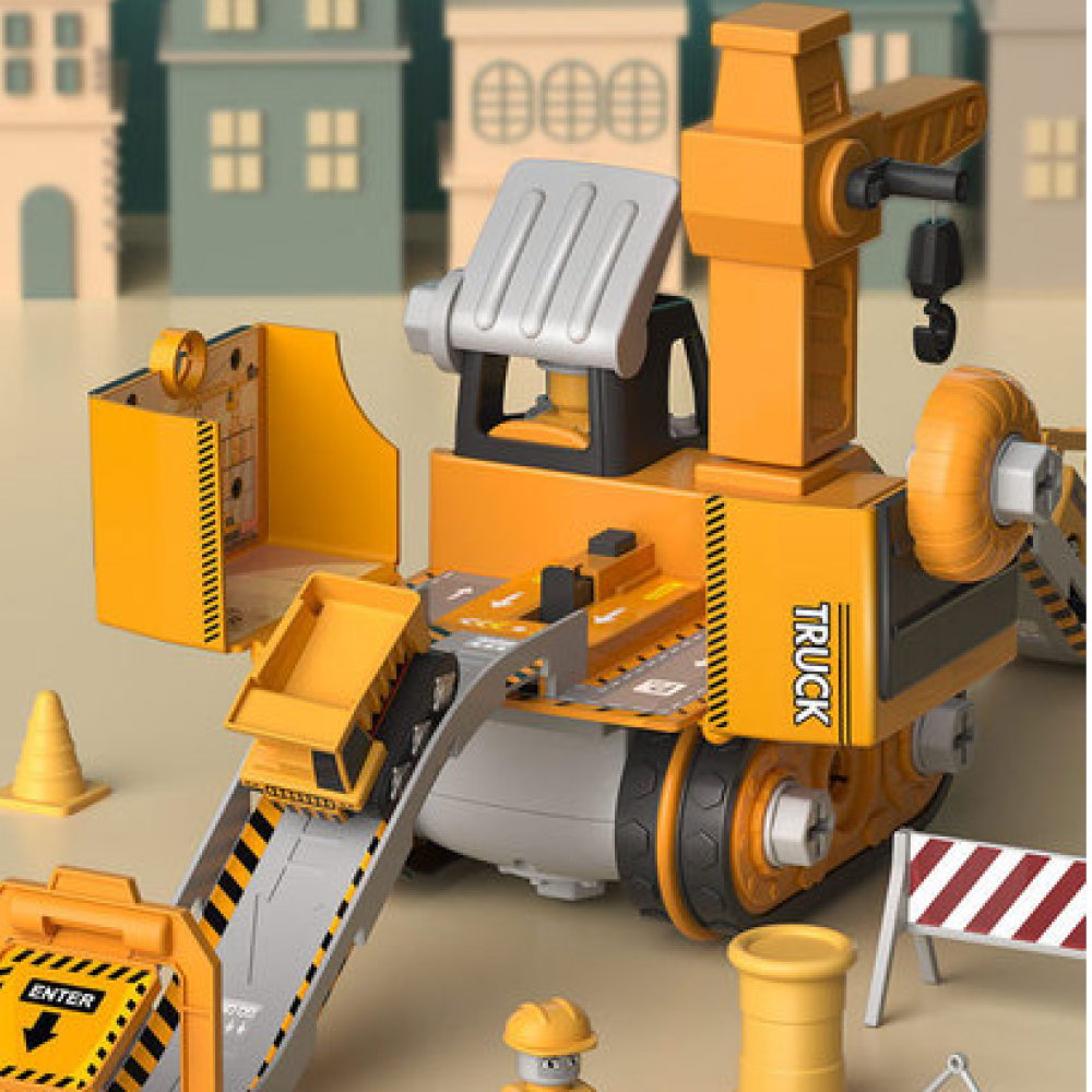 Détail de la pelle de construction jaune en plastique pour enfants, partie de l'ensemble avec camion et grue.