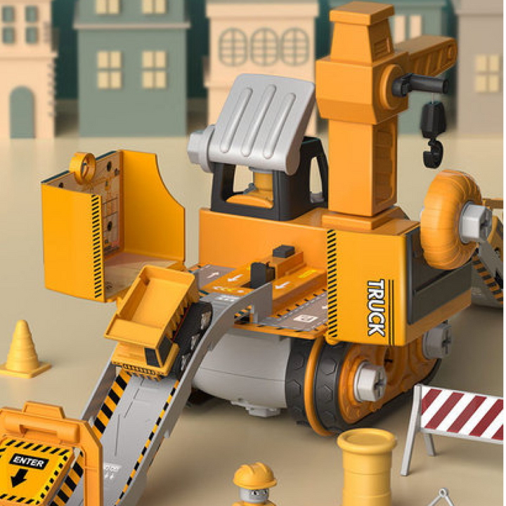 Détail de la pelle de construction jaune en plastique pour enfants, partie de l'ensemble avec camion et grue.