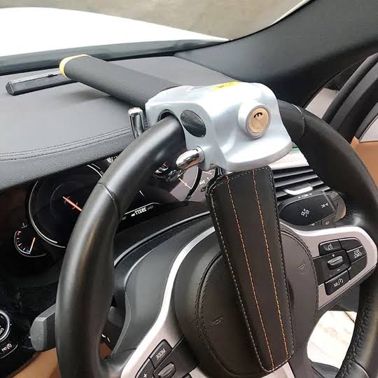 Antivol de volant réglable universel pour voiture, protection optimale contre le vol auto, dispositif dissuasif solide.