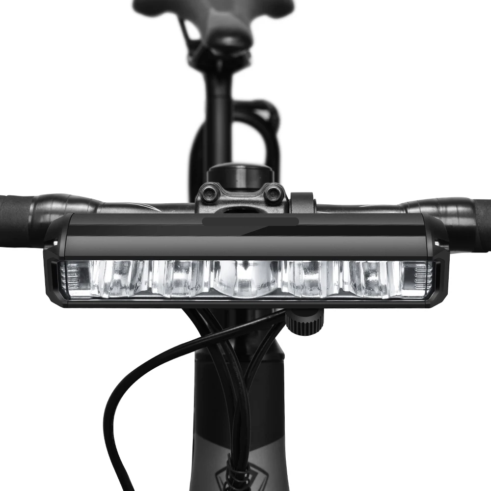 Accessoire vélo indispensable: lampe avant rechargeable USB, 1400 lumens pour sécurité optimale.