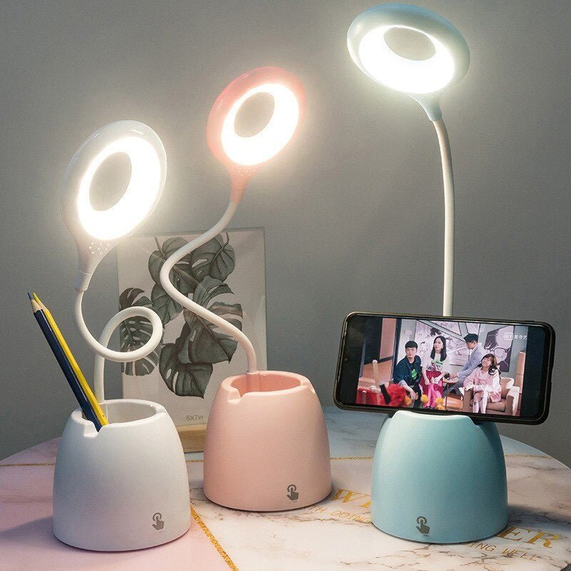 Lampe LED enfant rose avec support téléphone et rangement pour bureau ou chevet. Lumière ajustable.