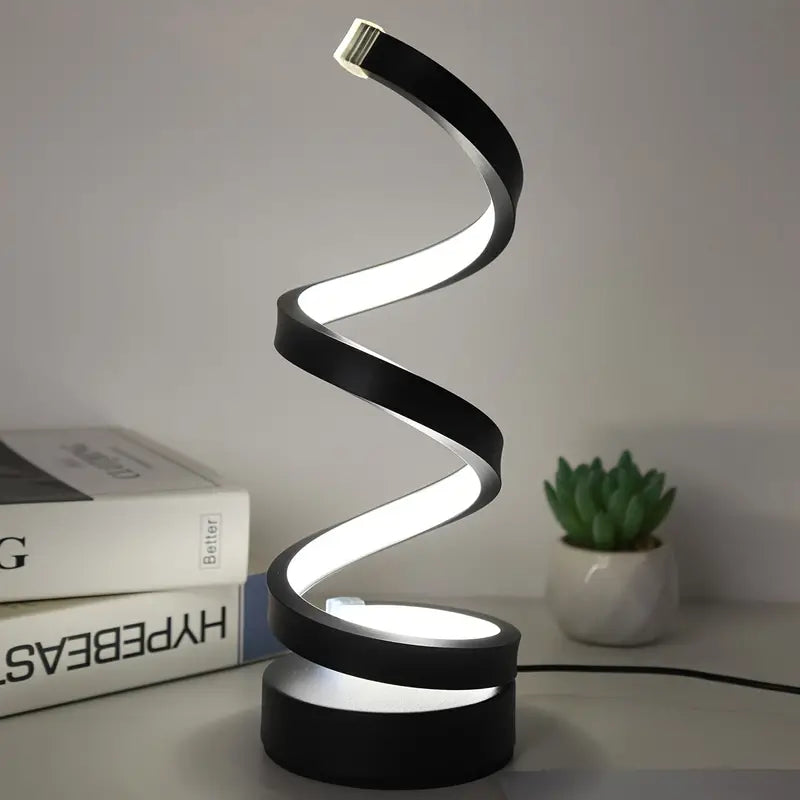 Élégante lampe de table LED noire spirale. Luminaire design moderne et efficace pour une décoration intérieure chic.
