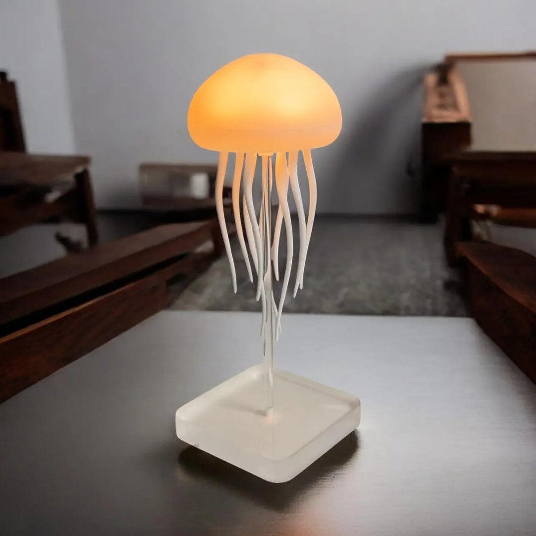 Lampe méduse LED relaxante pour chambre, ambiance marine apaisante avec méduses flottantes multicolores.