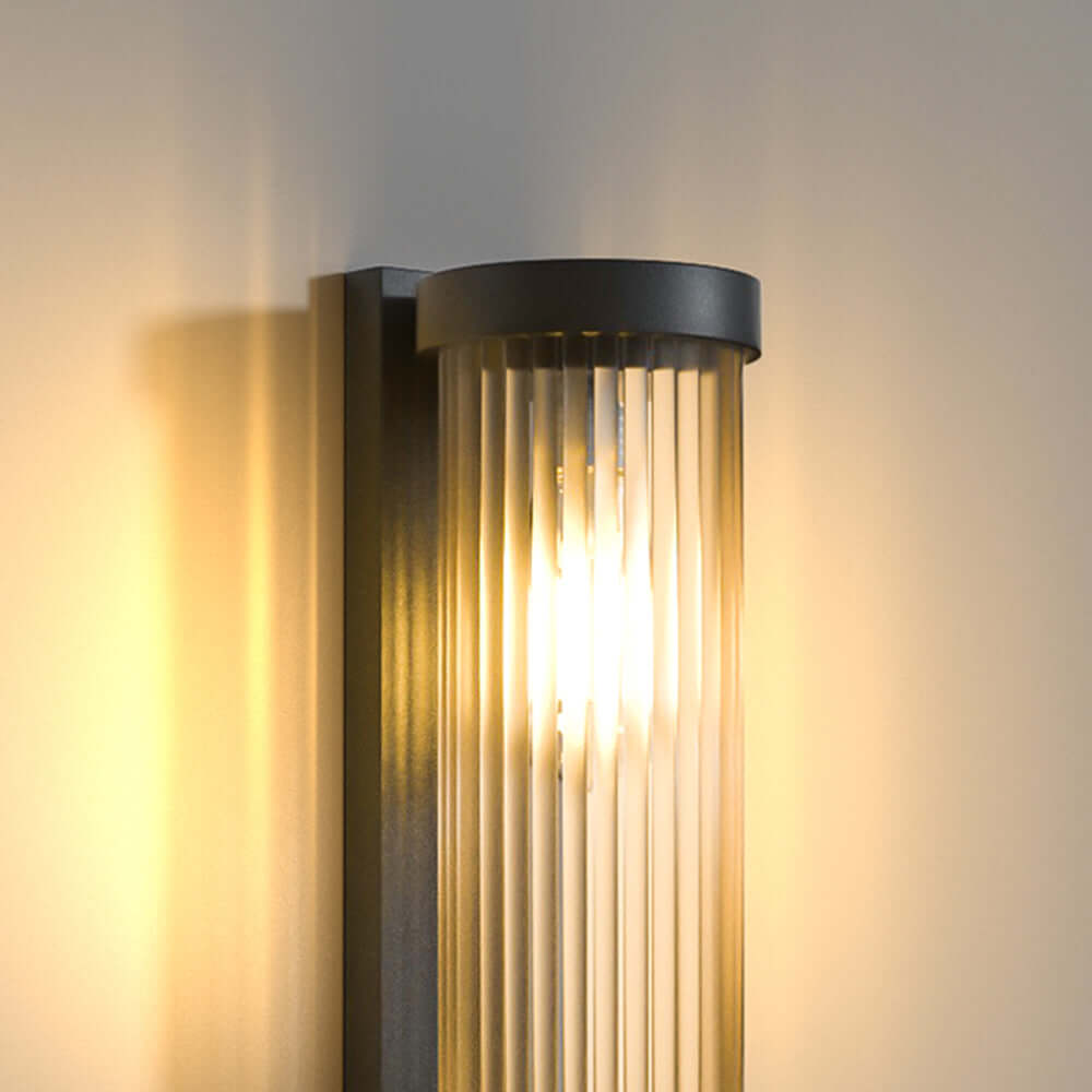 Éclairage solaire de pointe pour l'extérieur, lampe cylindrique en acier et verre, sans fil et économe en énergie.