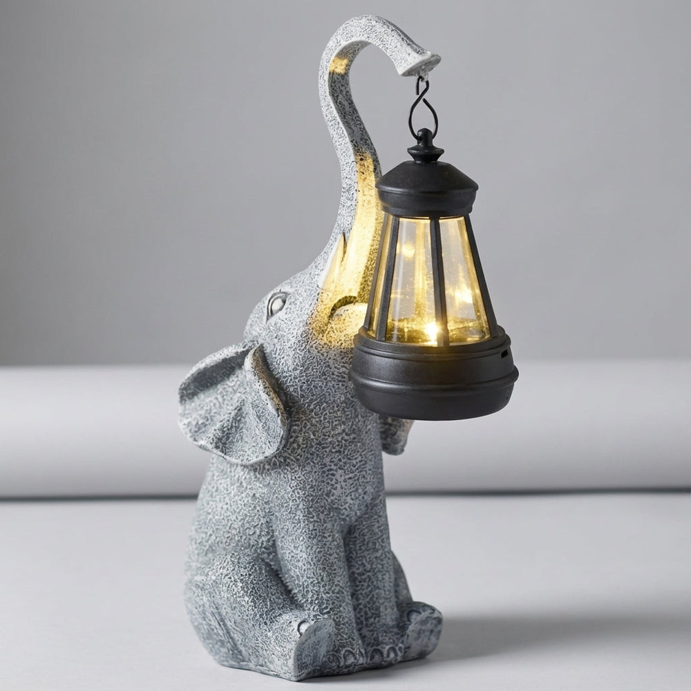 Décoration de jardin autonome : lampe solaire LED éléphant, étanche, idéal pour un éclairage d'ambiance.