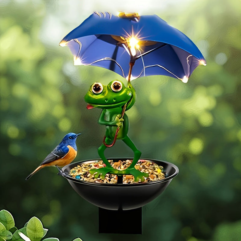 Statue grenouille solaire en résine lumineuse, éclairage extérieur LED pour une ambiance jardin féérique.