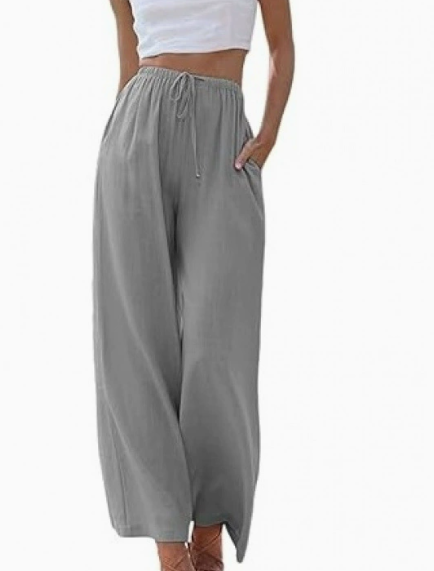 Taille haute élastique d'un pantalon large femme en lin, confortable et décontracté pour l'été.