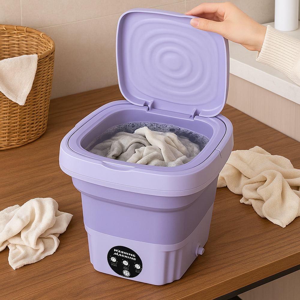 Lave-linge de voyage pliable avec fonction essorage, ultra compact pour optimiser l'espace en déplacement.