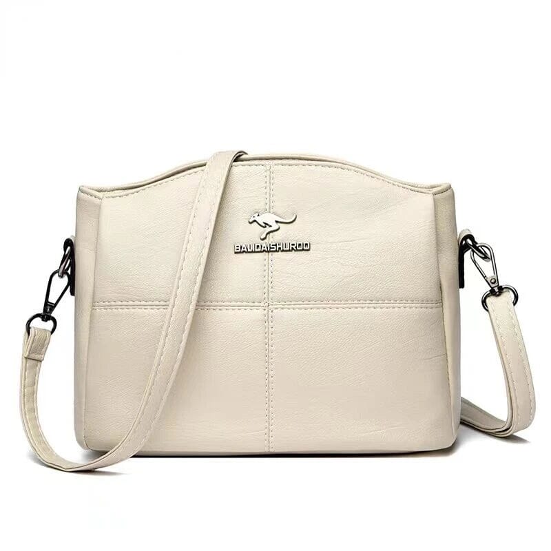 Vue de côté du sac à main femme en cuir, révélant son design épuré et sa forme pratique.