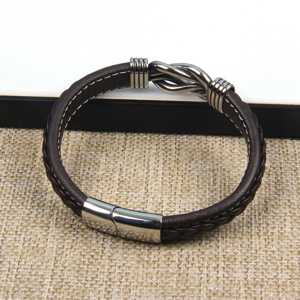 Bracelet intemporel: nœud infini symbolique, accessoire mode noir unisexe pour toutes les saisons.
