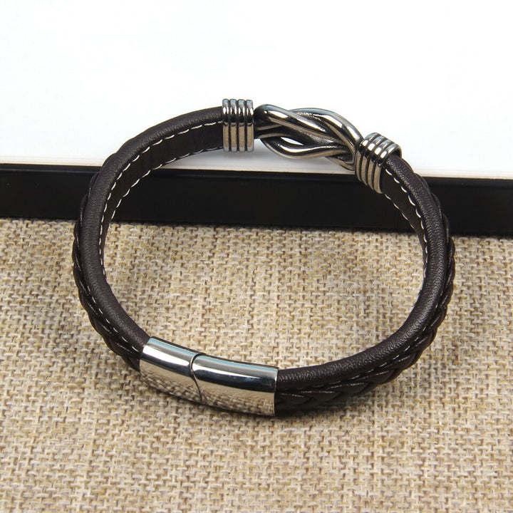 Bracelet intemporel: nœud infini symbolique, accessoire mode noir unisexe pour toutes les saisons.