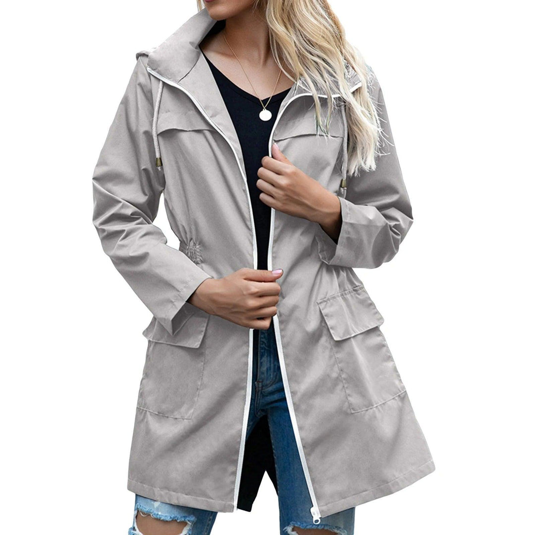 Chic manteau de pluie femme, veste imperméable élégante, idéal mode automne, tendance et confortable.