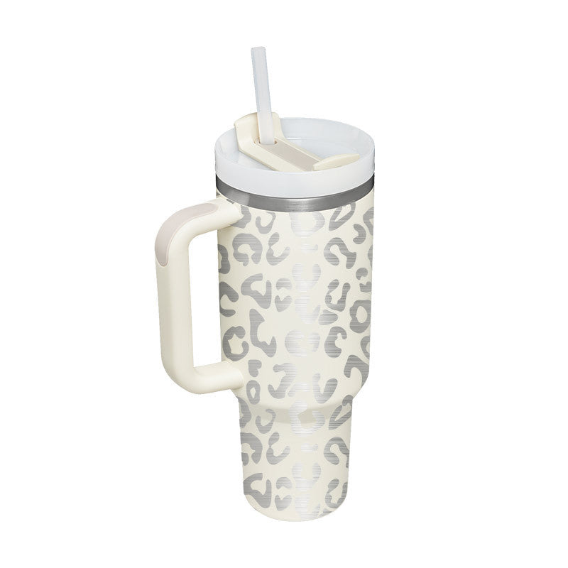 Mug isotherme avec poignée et paille, pour déguster vos boissons favorites partout.