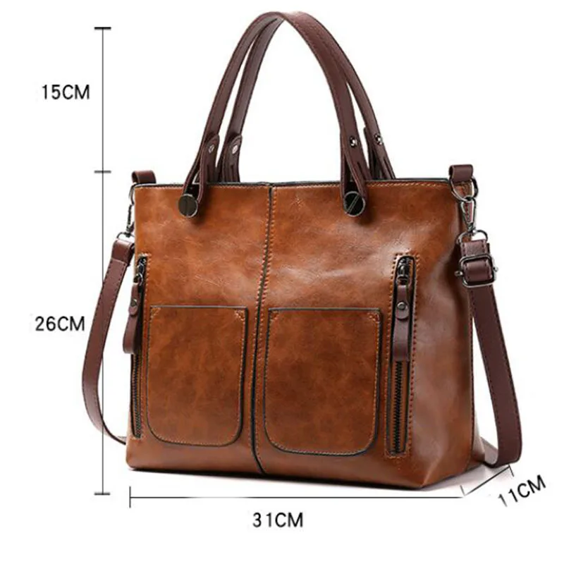 Sac élégant femme en cuir gris, bandoulière ajustable. Un accessoire de mode durable et pratique.