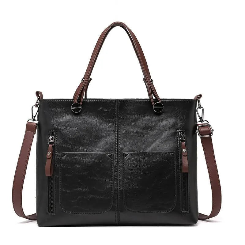 Sac à bandoulière en cuir noir pour femme, style élégant et durable. Idéal pour accessoire de mode.