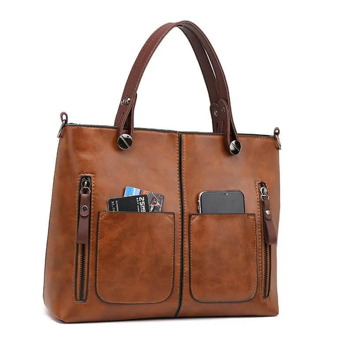 Sac bandoulière femme gris en cuir véritable. Design chic et moderne, parfait pour toute occasion.