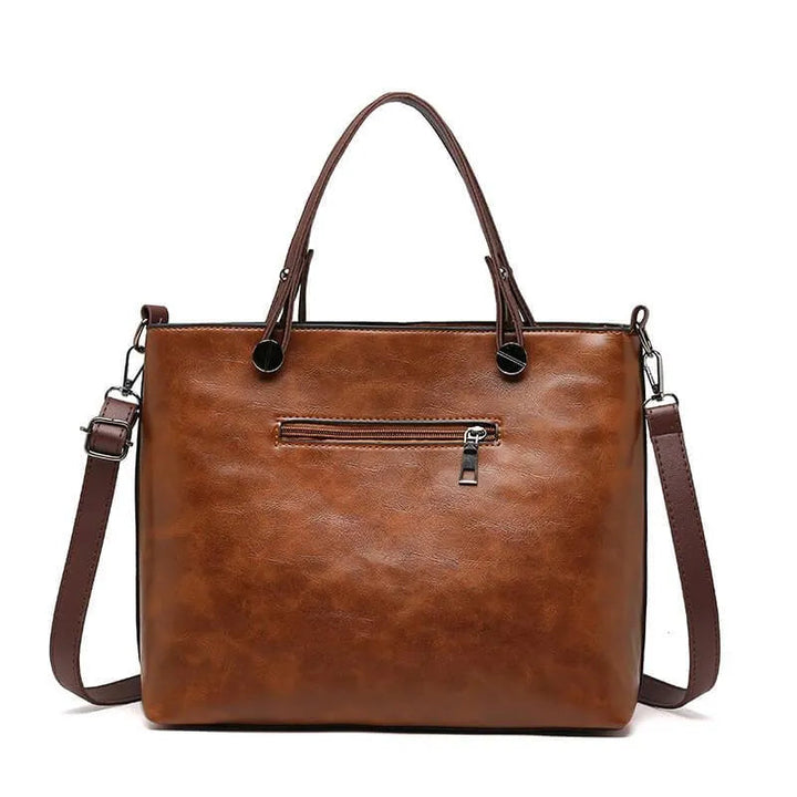 Sac chic en cuir marron, parfait pour femme moderne. Bandoulière ajustable pour un confort optimal.
