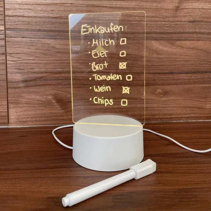 Carnet lumineux LED GlowPad allumé, affichant des notes claires pour une meilleure visibilité et créativité nocturne.