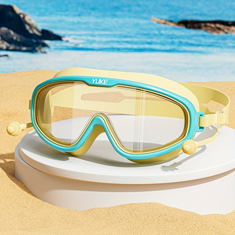 Design ergonomique lunettes de natation enfant, anti-buée, étanches, pour confort maximal en mer.