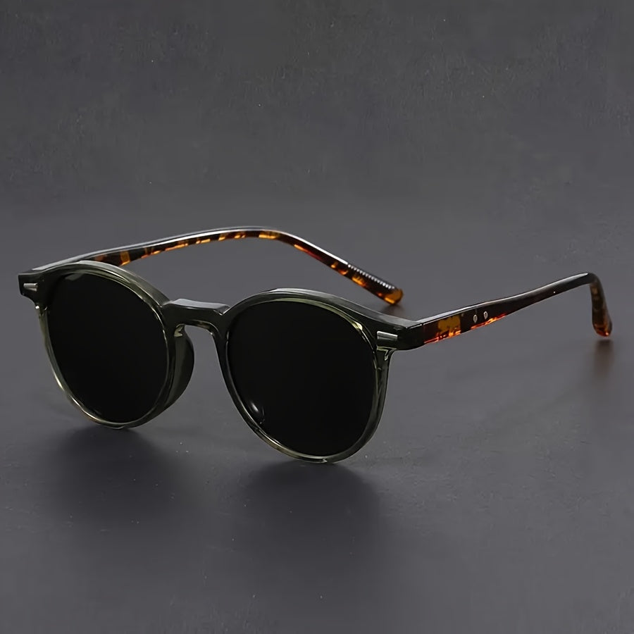 Monture ronde vintage pour hommes, lunettes de soleil écaille de tortue. Style rétro chic en polycarbonate.