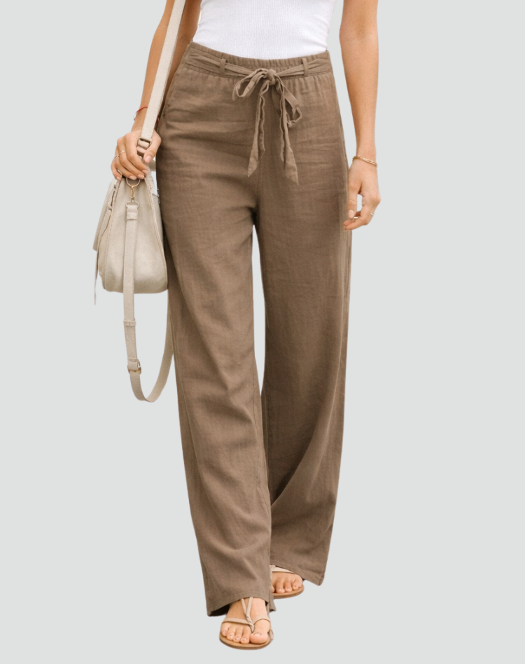 Pantalon fluide large femme, taille cordon, confortable et chic pour l'été.