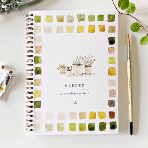 Ensemble du cahier d'exercices d'aquarelle, promu pour la détente et l'exploration de l'art créatif.