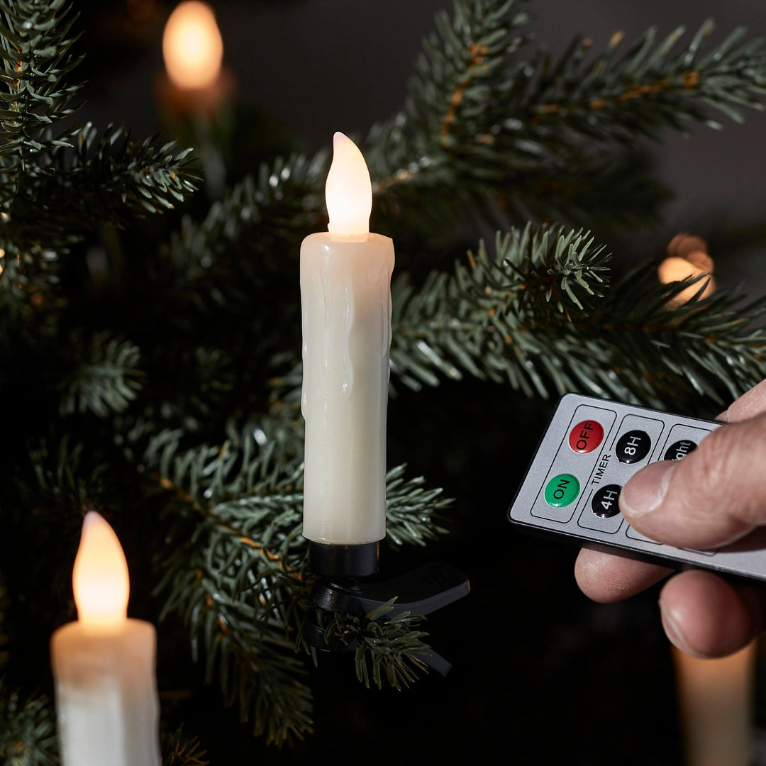 Bougies LED sans fil pour sapin de Noël, avec télécommande et minuterie. Parfaites pour une décoration lumineuse et festive.