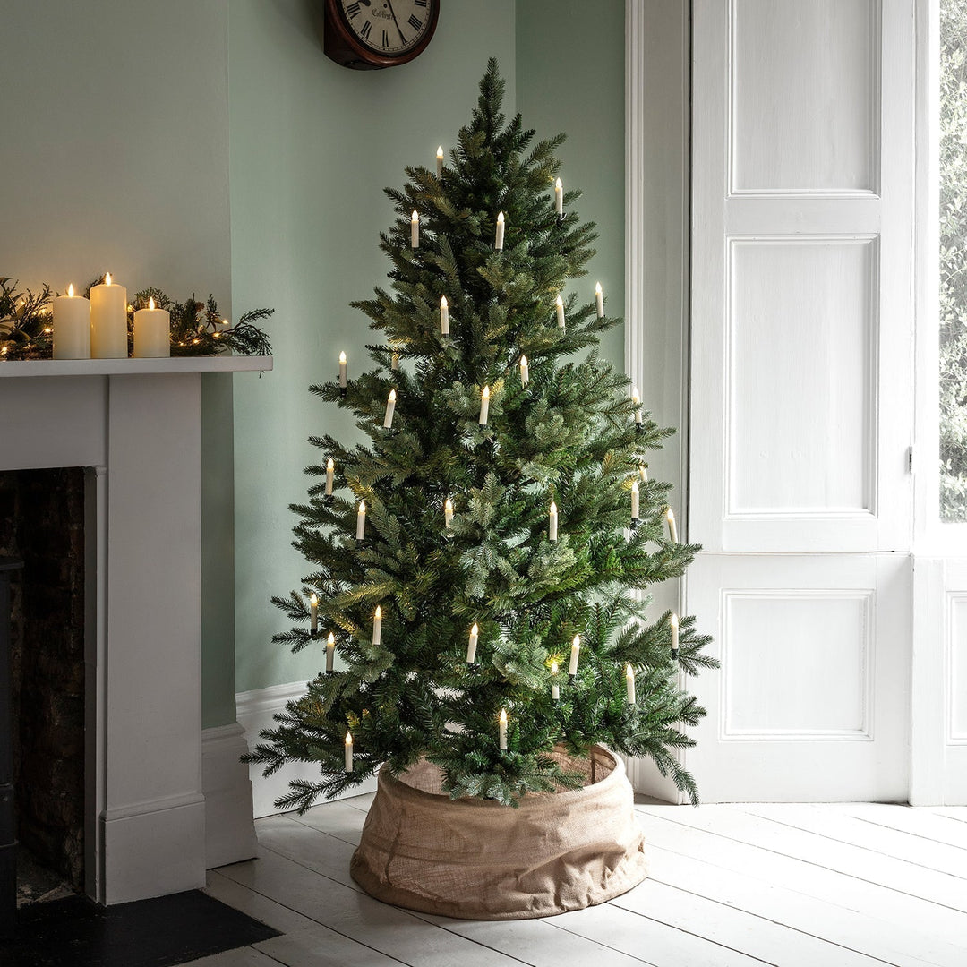 Lot de 20 bougies LED sans fil pour sapin de Noël. Installation facile, avec télécommande pour une décoration festive et lumineuse.