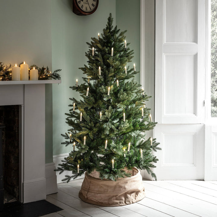 Lot de 20 bougies LED sans fil pour sapin de Noël. Installation facile, avec télécommande pour une décoration festive et lumineuse.