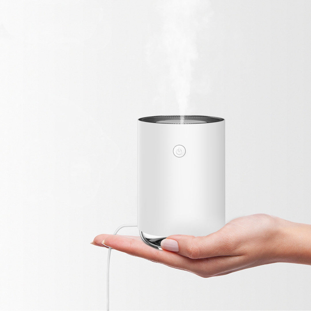 Humidificateur PureMist USB portable, design compact pour un air purifié et frais partout, maison/bureau.