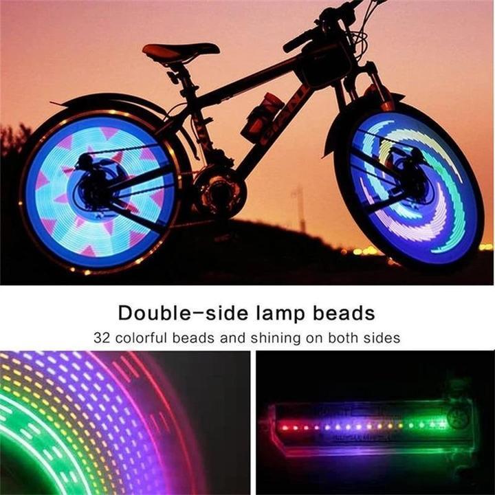 Cycliste de nuit avec lumières LED 3D brillantes sur roues, assurant une excellente visibilité et sécurité routière.