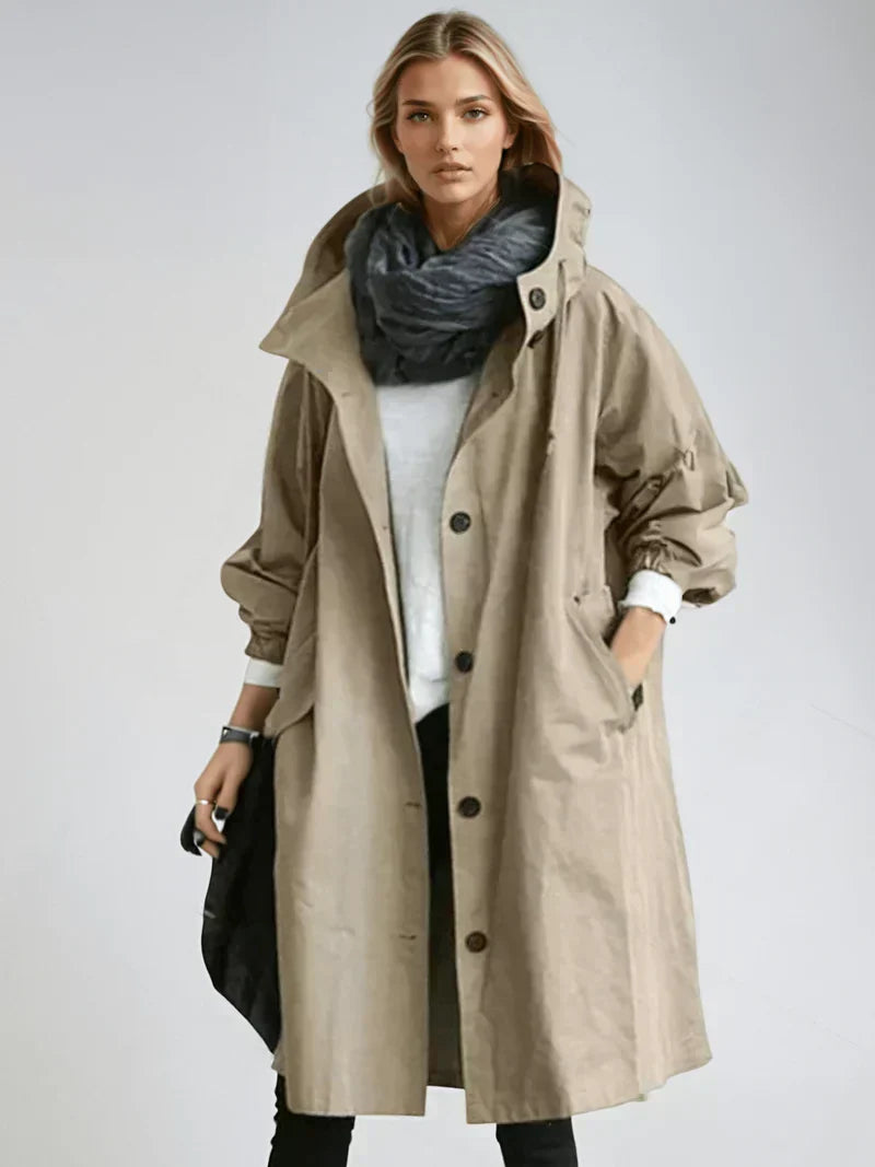 Imperméable femme élégant, veste longue avec capuche et ceinture, idéal mi-saison. Chic et coupe-vent.