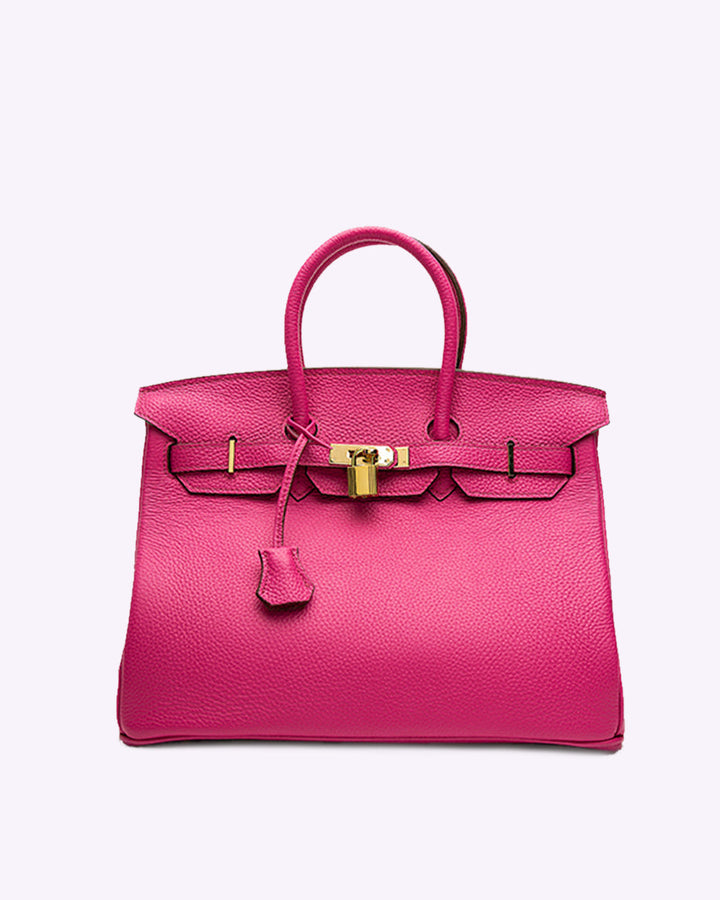 Sac à main élégant en cuir rouge pour femme, apporte une touche de couleur et de mode à votre look.