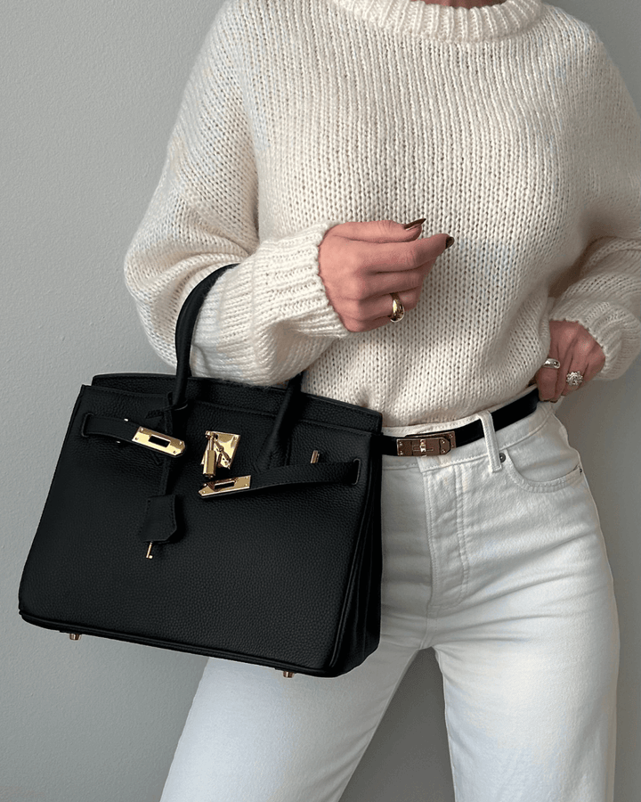 Élégant sac à main femme en cuir souple, polyvalent pour toute occasion, un incontournable de la mode.