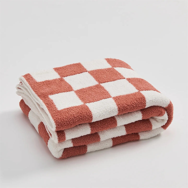 Plaid élégant à carreaux, une couverture décorative et douce pour chaque pièce de la maison.