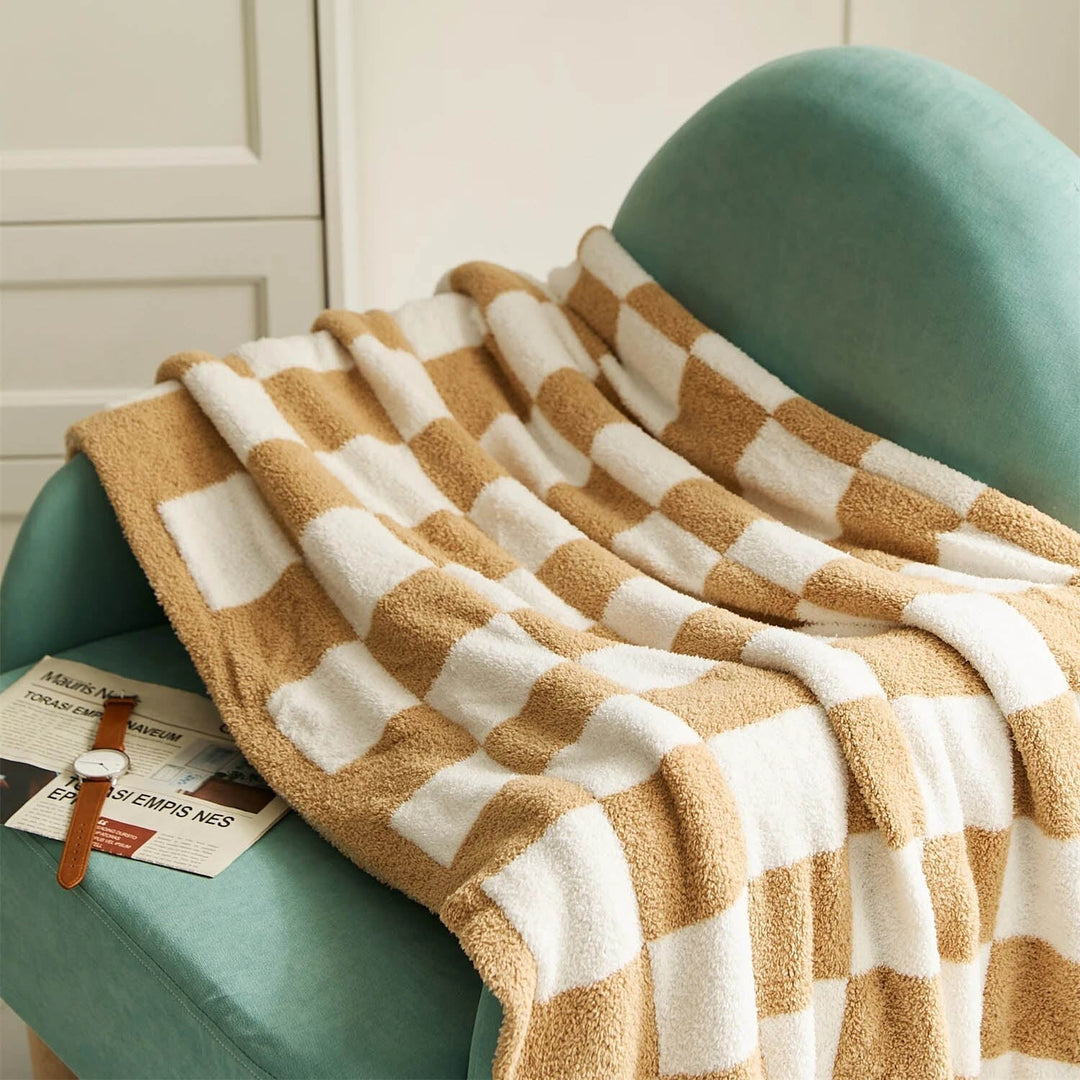 Plaid à carreaux multicolores, doux et chaud, parfait pour les soirées cocooning à la maison.