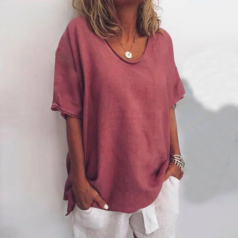 Blouse femme printanière ample avec manches courtes. Confort et élégance décontractée pour vos tenues d'été.