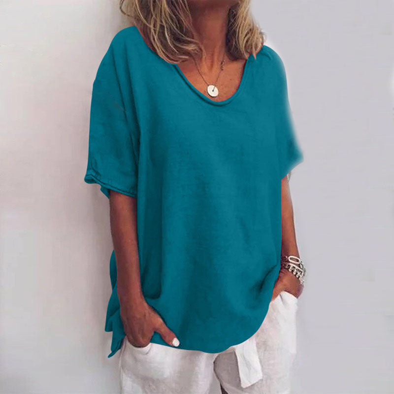 Tunique femme classique ample, manches courtes. Top chic et décontracté, idéal pour le printemps et l'été.