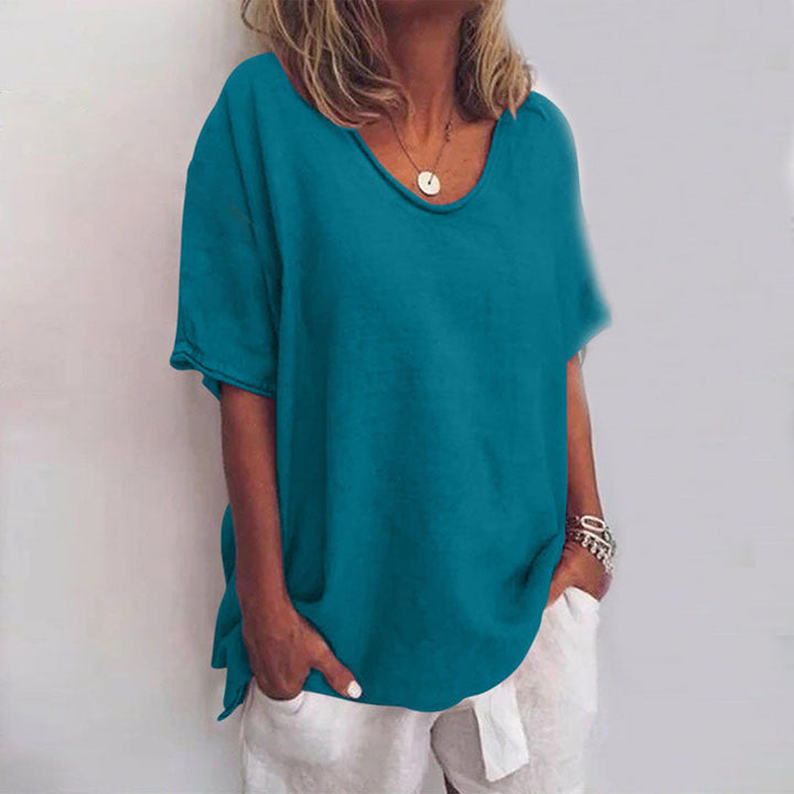 Tunique femme classique ample, manches courtes. Top chic et décontracté, idéal pour le printemps et l'été.