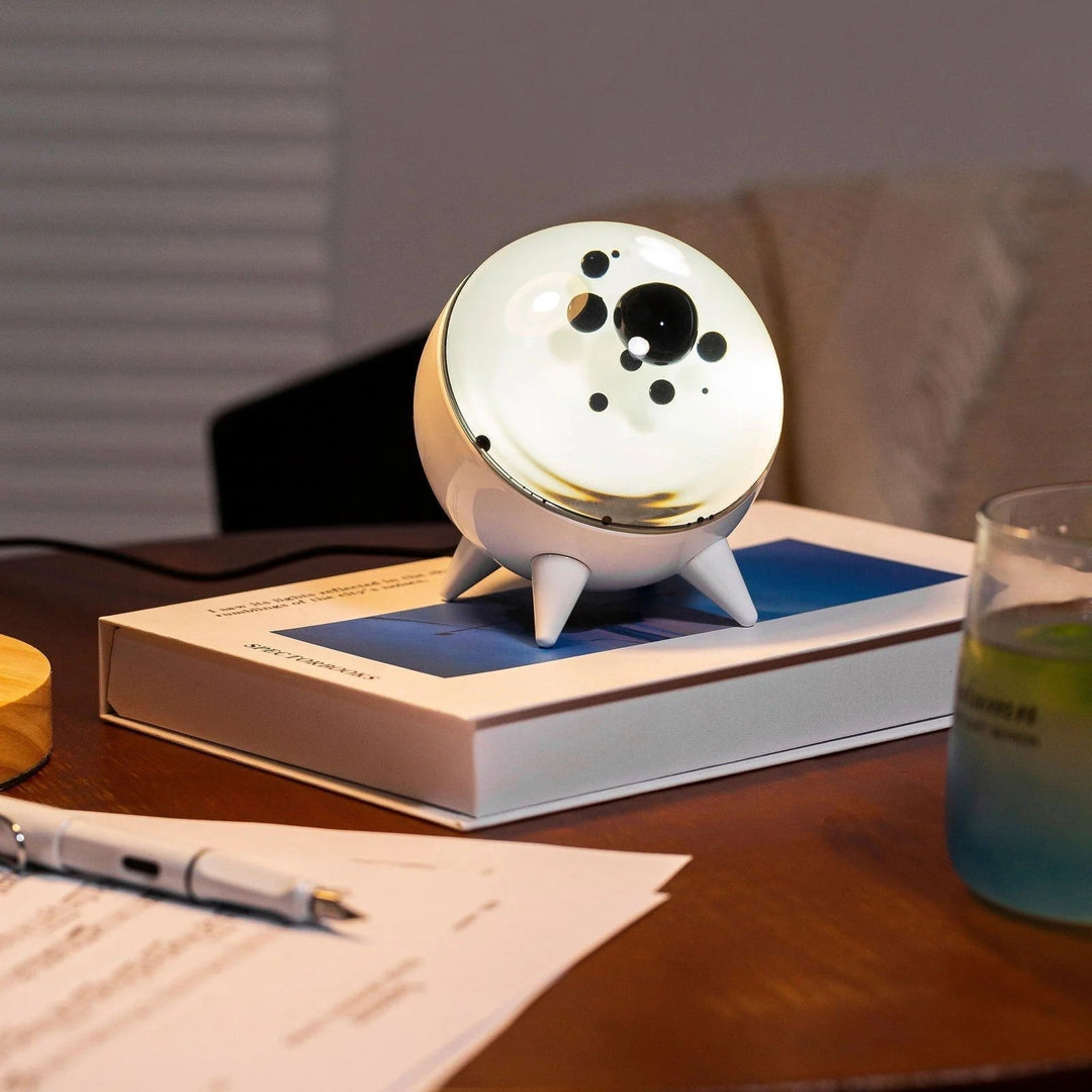 Cadeau original: lampe ferrofluide musicale interactive. Décor high-tech et ambiance lumineuse unique pour la maison.