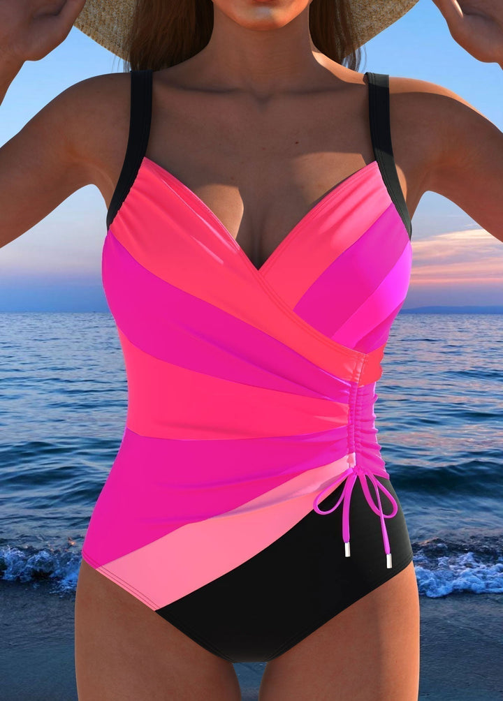 Maillot de bain femme imprimé éclatant, coupe une pièce avec décolleté croisé, essentiel pour l'été plage/piscine.