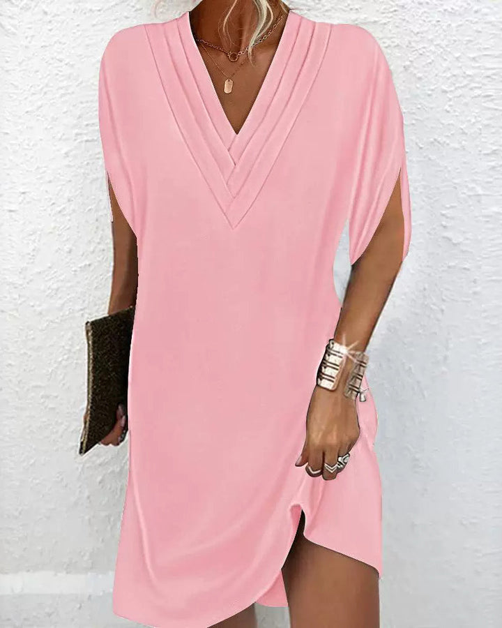 Mode femme: robe unie, manches fendues, style élégant adapté à toute occasion chic.