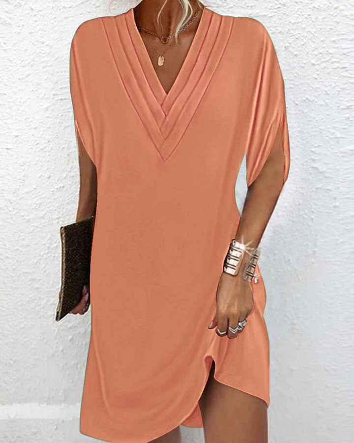 Robe élégante pour femme, couleur unie, manches fendues, confortable et moderne.