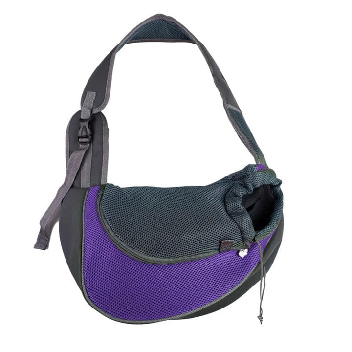 Sac de transport design pour chat ou chien, doté d'une bandoulière, pour un confort animal optimal en voyage.