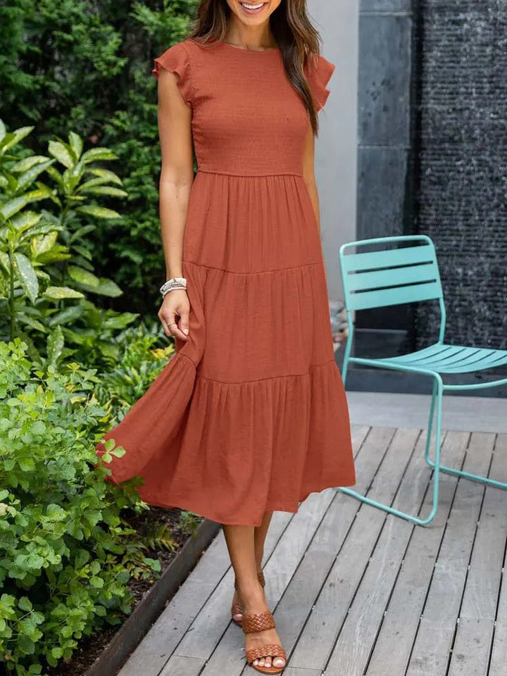 Élégante robe femme avec effet ventre plat intégré, style raffiné et grand confort au quotidien.