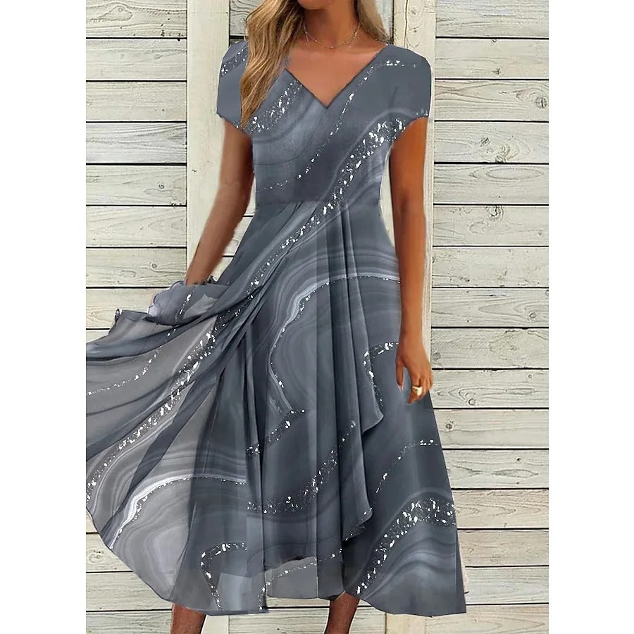 Robe midi femme chic et polyvalente, imprimée fluide, col V, parfaite pour la mode féminine.