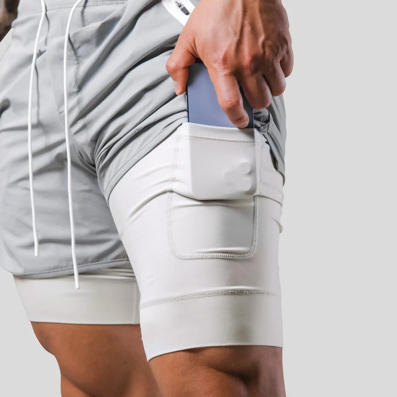 Pantalon de course à pied homme 2-en-1, tissu respirant. Parfait pour athlétisme.