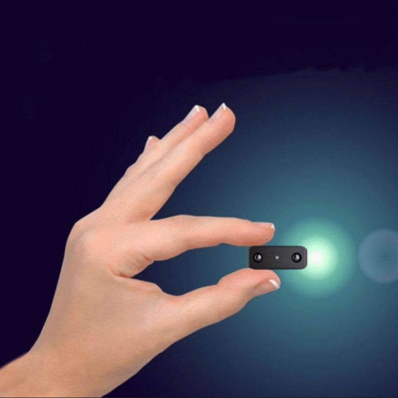 Mini caméra espion HD avec détection de mouvement et audio pour surveillance discrète.