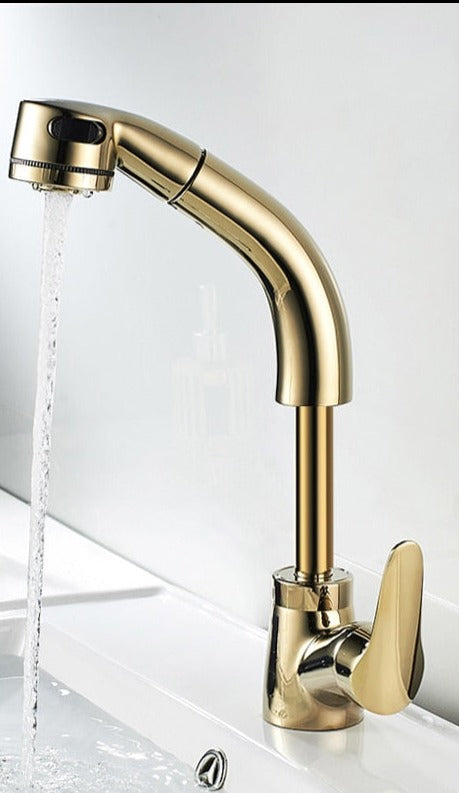 Mitigeur lavabo blanc pur avec douchette extractible. Robinet de salle de bain élégant pour un style épuré.