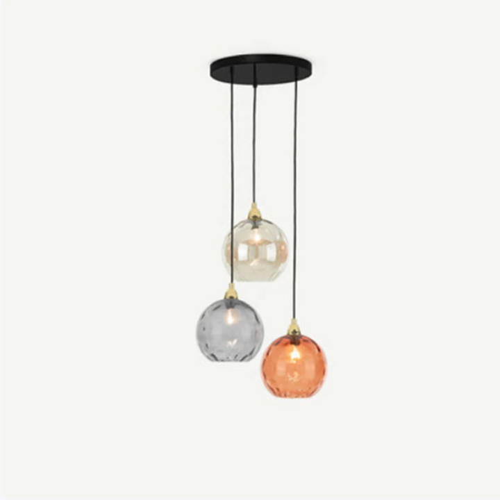 Cluster 3 luminaires, suspension moderne pour un salon cosy et tendance.